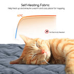 Cat sleeping on the self-warming fleece mat, no electricity needed